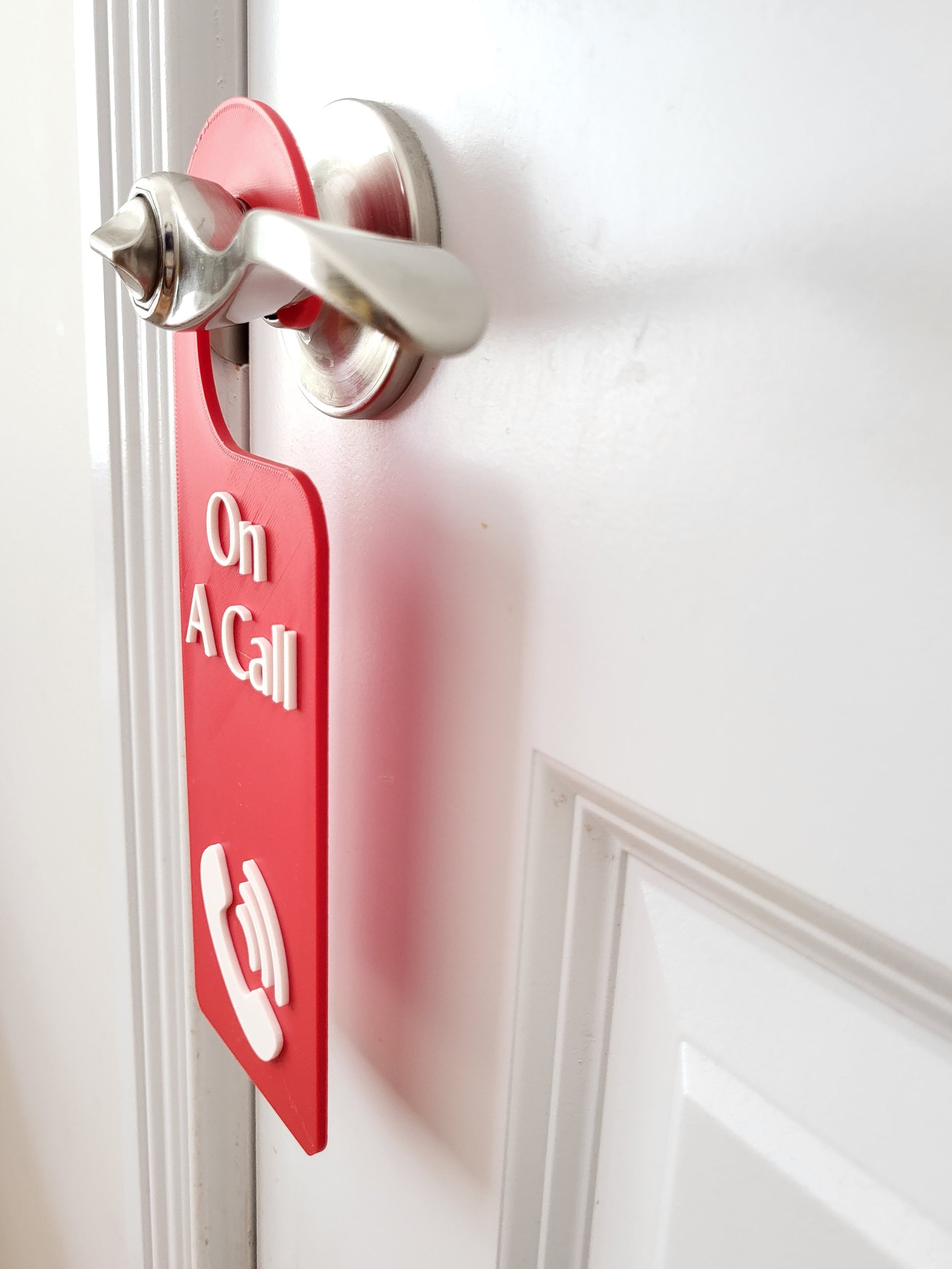 On a call sign,
Phone call sign,
Do not disturb,
Home office sign,
Work from home,
Privacy door sign,
Remote work sign,
Call in progress,
Door hanger sign,
Quiet please sign,
Meeting door sign,
Red door hanger,
Office decor,